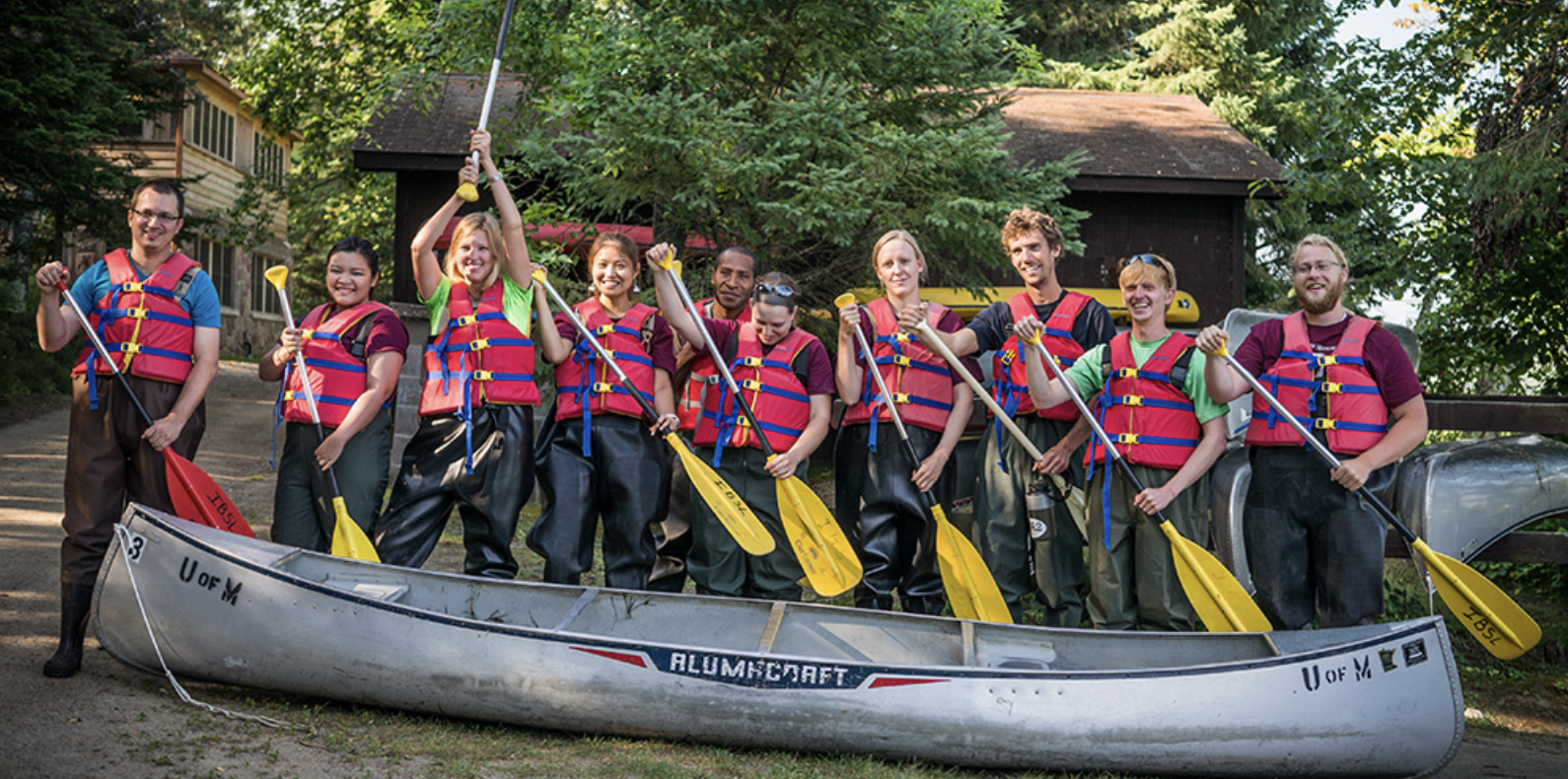 PMB graduate student with canoe