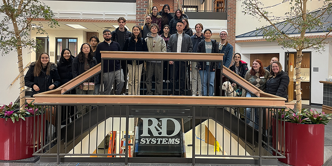 Group of students stand at Bio-Techne headquarters