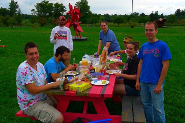 Seelig lab eating lunch at Franconia sculpture park