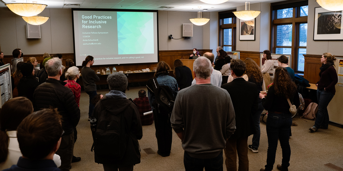 Group watching presentation at Inclusive Excellence Symposium