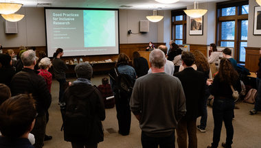 Group watching presentation at Inclusive Excellence Symposium