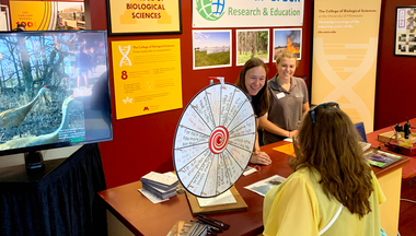 Staff from Cedar Creek talking with Minnesota State Fair attendees