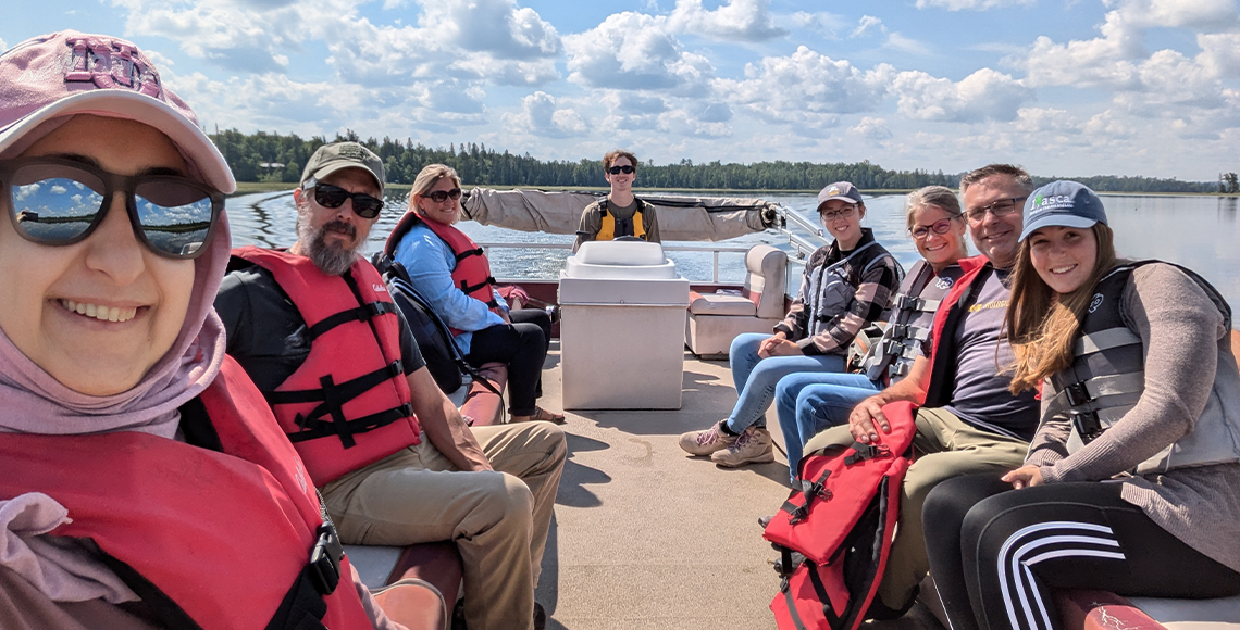 UMBS and IBSL staff on Lake Itasca