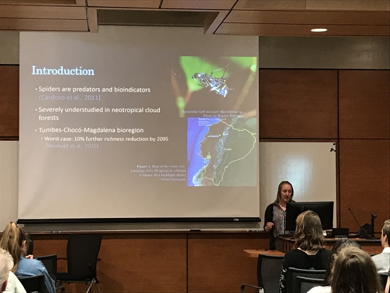 Kristin Robinson giving a research talk on campus