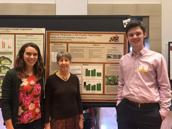 Marlene Zuk with students at a poster session