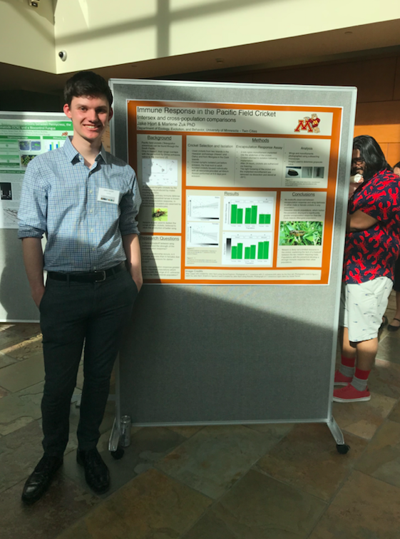 Jake Hjort at a poster session on campus